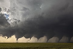 First place: Evolution of a Tornado: Composite of eight images shot in sequence as a tornado formed in Kansas. – Attribution: JasonWeingart (CC BY-SA 4.0)