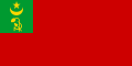Bandera de la RSS de Corasmia (1920-1925), qu'utilizaba un focete cruciáu por una pala y con una fesoria.