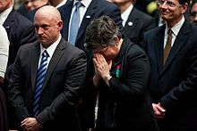 Kelly and Homeland Security Secretary Janet Napolitano at the Tucson memorial service