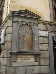 Oratoire d'une rue de Florence avec la Vierge, Philippe Néri, et Marie-Madeleine de Pazzi, par Cosimo Ulivelli (1668).