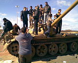 People on a tank in a Benghazi rally, 23 February 2011