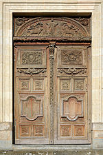 Sculpted wooden door of the chapel in the Collège des Oratoriens, now Montesquieu high school - Le Mans, Sarthe, France
