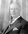 Al Smith (1873-1944), president dau consòrci Empire State Inc.