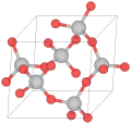 Estructura cristalina del α-cuarzo (las bolas rojas son de oxígeno y las grises de silicio)