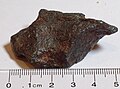 Iron meteorite, 5 cm long, weighing 77 grams