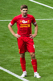 Garrard in an all-red kit with white boots