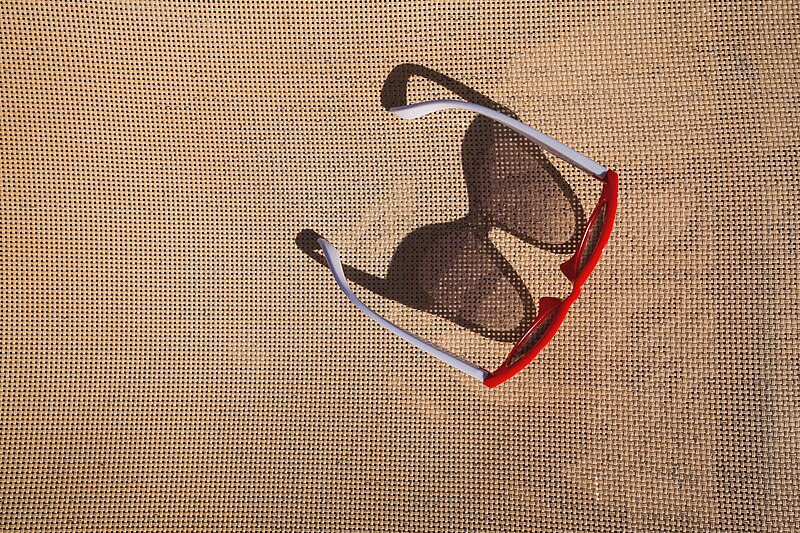 File:Child's Sunglasses on Bed (48727011177).jpg