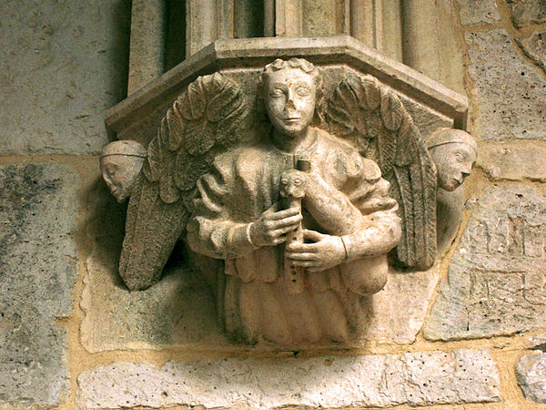 Angel with a bagpipe in Burgos, Spain
