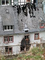 Burned slate roof house in Monschau (2006)