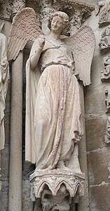 Усмихнатият ангел, портал на катедралата в Реймс (1240).
