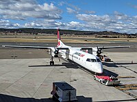 A QantasLink (Sunstate Airlines) DHC-8-400 at Canberra Airport