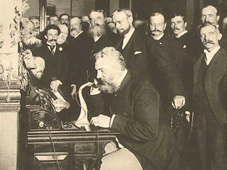 Alexander Graham Bell makes the first telephone call from New York City to Chicago in 1892. Bell, an immigrant from Scotland who settled in Boston, invented the telephone 16 years earlier, in 1876.