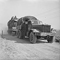 Tractor towing a trailer loaded with a Churchill tank during preparations for crossing the Rhine, 23 March 1945.