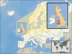 Ibùdó ilẹ̀  Wélsì  (inset - orange) in the United Kingdom (camel) ní the European continent  (white)