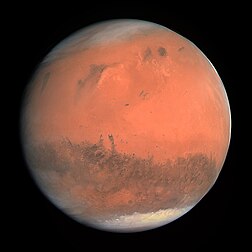 Imagem em truecolor de Marte tomada em fevereiro de 2007 pelo instrumento OSIRIS da sonda espacial Rosetta lançada pela Agência Espacial Europeia. (definição 2 205 × 2 205)