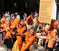Revellers dressed in orange in Amsterdam, Koninginnedag 2007