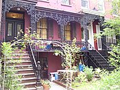 Italianate townhouses[134] on East 18th Street (1853), with cast-iron verandas reminiscent of the French Quarter of New Orleans.[133]