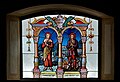 15. Házaspárok mintája a Mária mennybemenetele plébániatemplom ólomüveg ablakán. Az ablak két szentet ábrázol, Torribia Máriát és Izidor Gazdát, akik házasok voltak (Nesselwängle, Ausztria) (javítás)/(csere)