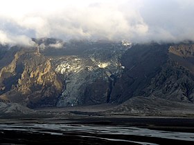 ... placed there during jökulhlaup and eruption of lava flows, which trickled beneath the glacier down to the valley