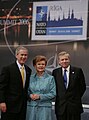 2006 - President George W. Bush stands with President Vaira Vike-Freiberga of Latvia, and NATO Secretary General Jaap de Hoop Scheffer during a photo opportunity at the start of the 2006 NATO Summit in Riga, Latvia