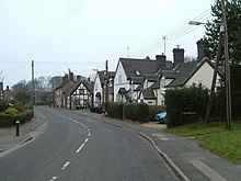 Betley- The main road, looking north, the postmans bike at rest - geograph.org.uk - 147874.jpg