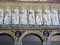 Vitalis among the saints, in Heaven, from the 6th century Basilica of Sant'Apollinare Nuovo, in Ravenna.
