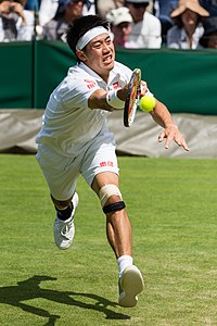 Јапански тенисер Кеј Нишикори у првом колу Вимблдона 2013. године.