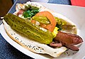 en Chicago-style hot dog er pølse i brød toppet med ulike grønnsaker som tilbehør
