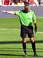 A referee signaling a foul.