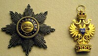 Řádová hvězda a odznak (revers)