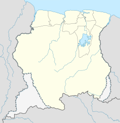 Mapa konturowa Surinamu, u góry nieco na prawo znajduje się punkt z opisem „Flora”