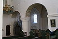 Vestervig kirke. Vinduet i baggrunden og rumadskillelsen er udformet i typisk romansk rundbuestil.