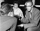 Malcolm X, likely at a welcoming event for the African-American Students Foundation (1959 or 1960)