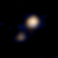 La prima immagine a colori di Plutone e di Caronte
