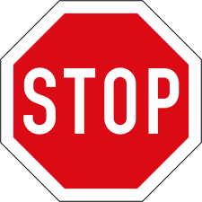 Semnalul internațional de oprire standard, în urma Convenției de la Viena privind semnalizările rutiere din 1968