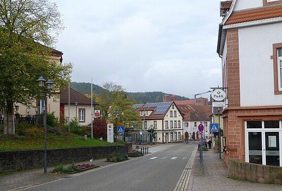 Houses on the main street (L495). Bank at left (former Town hall)