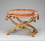 Louis XVI style folding stool (pliant); 1786; carved and painted beechwood, covered in pink silk; 46.4 × 68.6 × 51.4 cm; Metropolitan Museum of Art