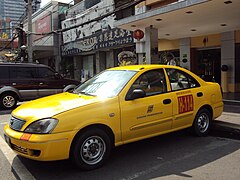 Airport taxis, which are yellow