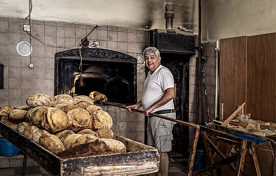 Traditional baker in Qormi, Malta Photographer: Noel Portelli