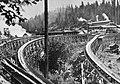 Several flume sections leave the mill to converge into one v-shaped trough for the 54-mile run to Madera, California.[3]