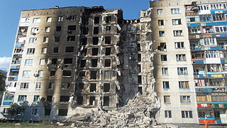 Itä-Ukrainan sodassa 2014 vaurioitunut rakennus.