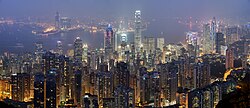 elevated night panorama on illuminated city