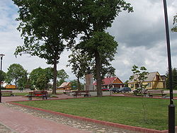 Main town square with monument to Antanas Strazdas