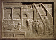 Dans un décor de palais antique, Salomé, représentée deux fois, danse puis se détourne tandis qu'un serviteur présente la tête de Jean-Baptiste à Hérode.