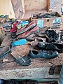 A Cobbler mending a boot in Northern Ghana 02