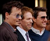 Depp, Jerry Bruckheimer, and Tom Cruise at a ceremony for Bruckheimer to receive a star on the Hollywood Walk of Fame (24 June 2013)
