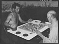 English: Japanese farm workers in Twin Falls, ID play Go during WWII Français : fermiers japonais jouant au go durant la seconde guerre mondiale.