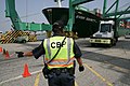 U.S. CBP officer directing a truck