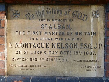 Dedication stone to Saint Alban the martyr, laid by E. Montague Nelson, J.P., on 18 October 1887. It records that Rev. George Henley Manbey was the vicar-designate, that Edward Monson, Jr.[13] was the architect, and that Joseph Dorey[14] was the builder.