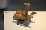 Cucuteni figurine staying on a miniature chair; 4750–4700 BC; ceramic; discovered at Târpești (modern-day Romania); Archaeology Museum Piatra Neamț